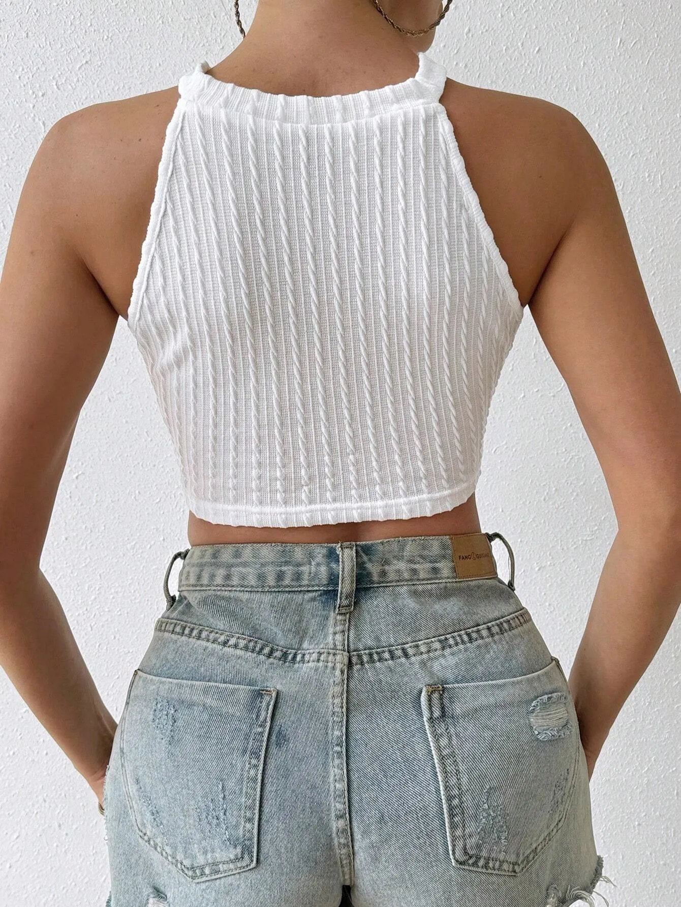 Chic Tassel-Trimmed Knit Crop Top with Ribbed Detail