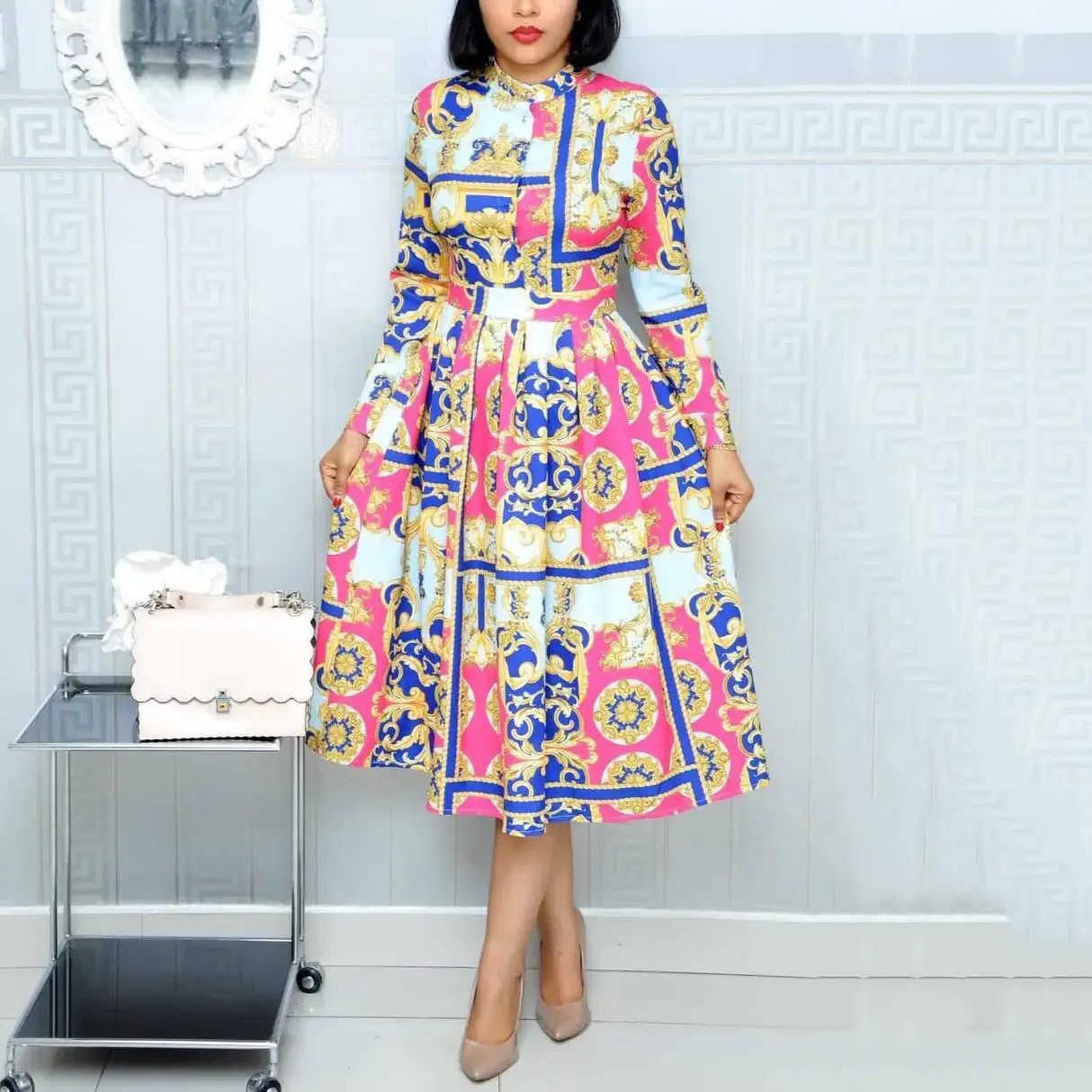 "Elegance in Motion – High-Waisted Pleated Dresses with Sleek Long Sleeves"