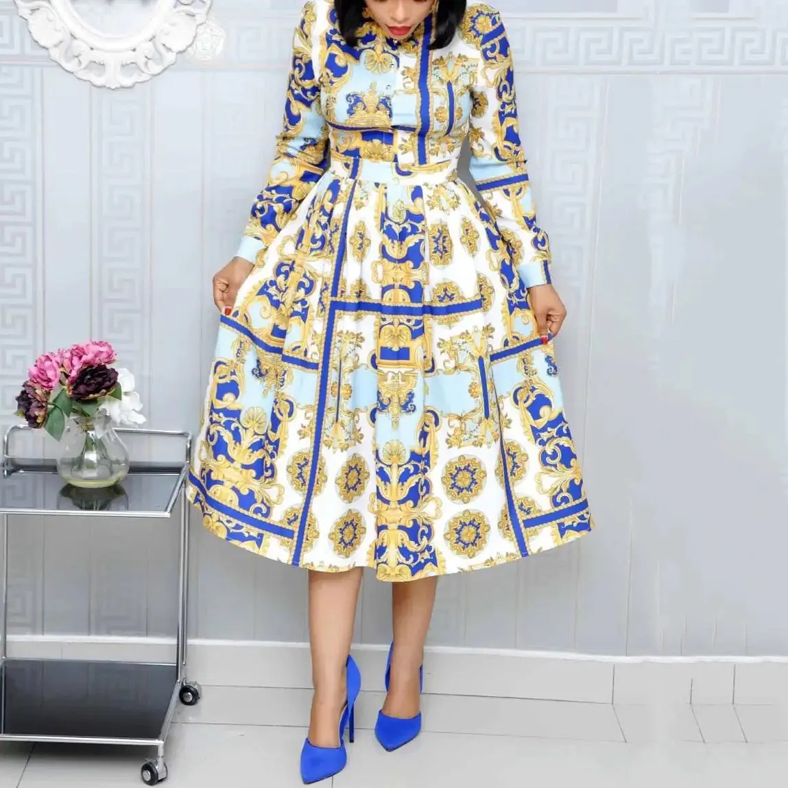 "Elegance in Motion – High-Waisted Pleated Dresses with Sleek Long Sleeves"