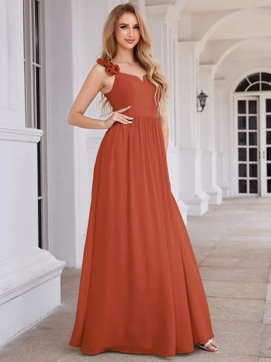Robe de demoiselle d'honneur élégante en mousseline de soie col en V bretelles florales taille empire