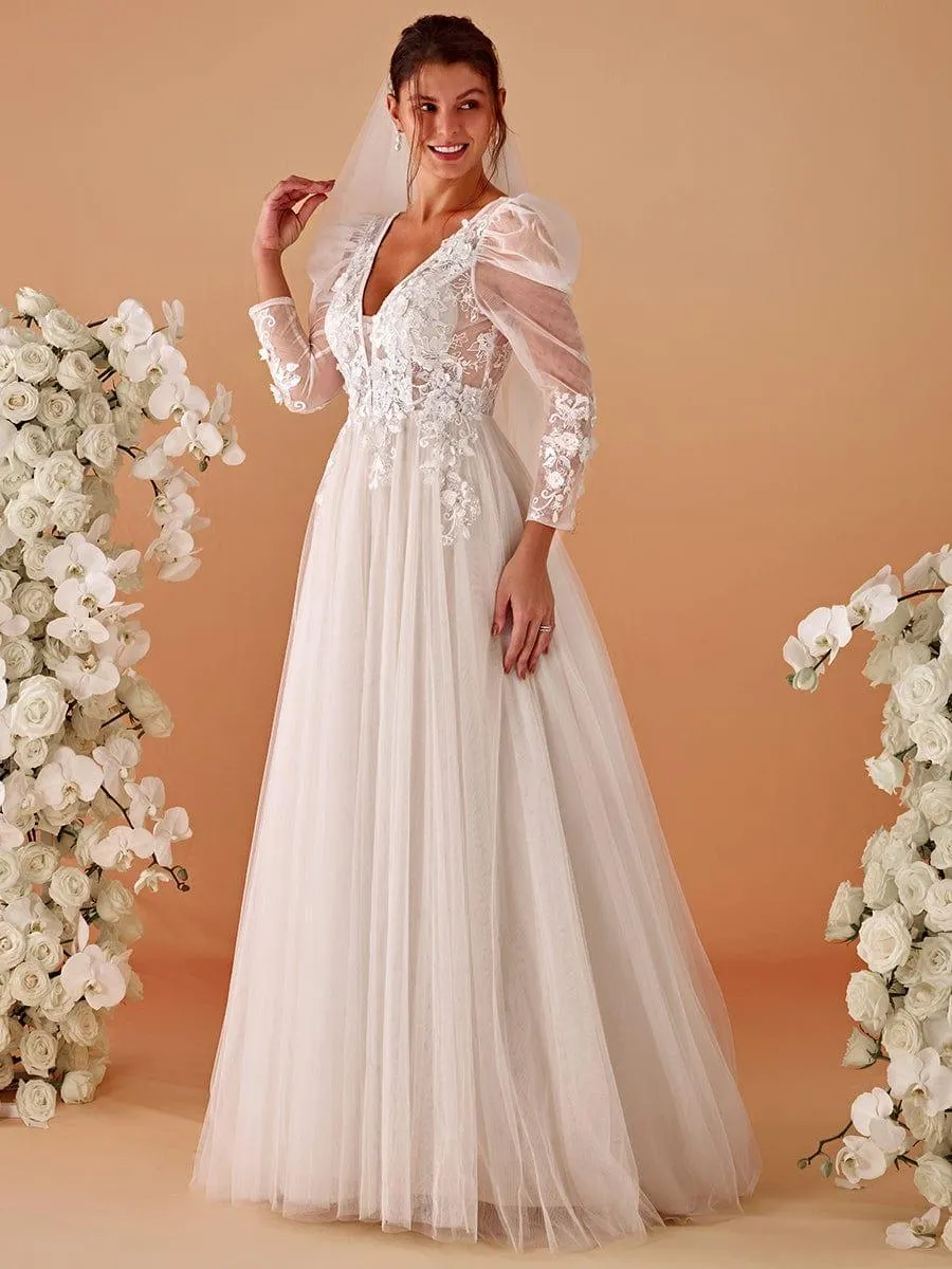 Robe de mariée transparente à col en V et manches gigot