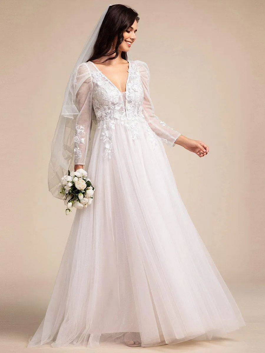 Robe de mariée transparente à col en V et manches gigot