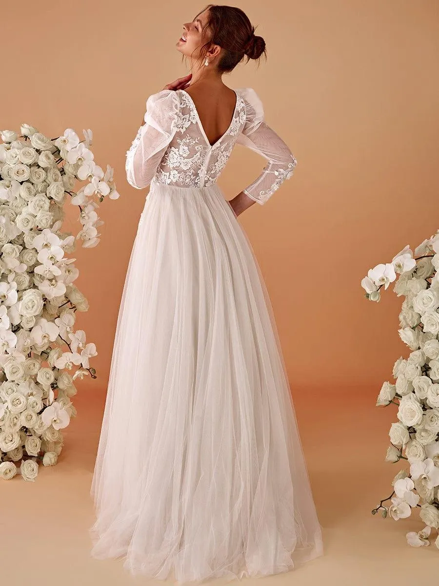 Robe de mariée transparente à col en V et manches gigot