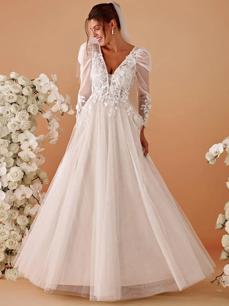 Robe de mariée transparente à col en V et manches gigot
