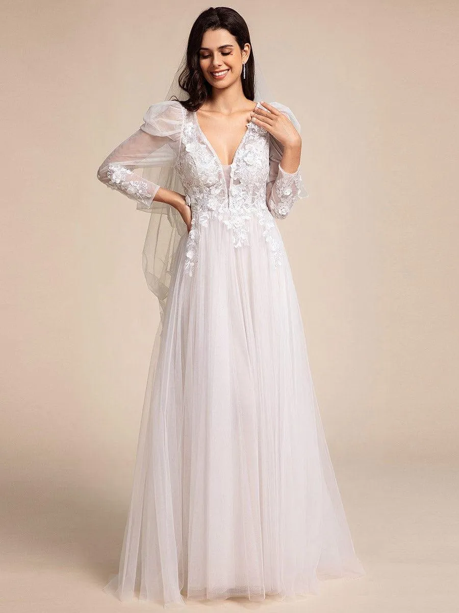Robe de mariée transparente à col en V et manches gigot