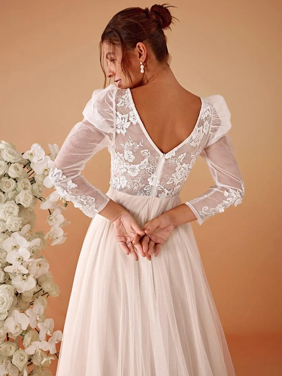 Robe de mariée transparente à col en V et manches gigot