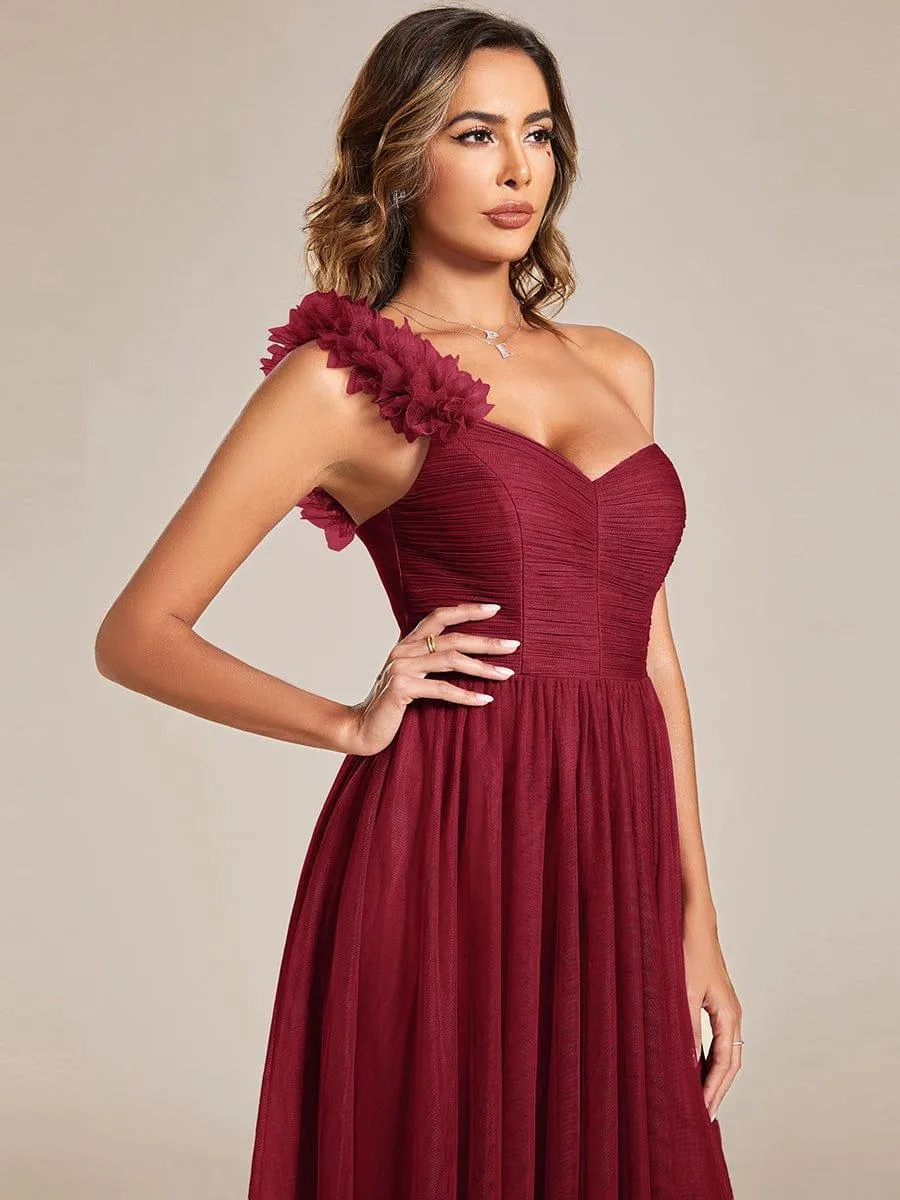 Robe de soirée asymétrique en tulle à appliqués et fente haute