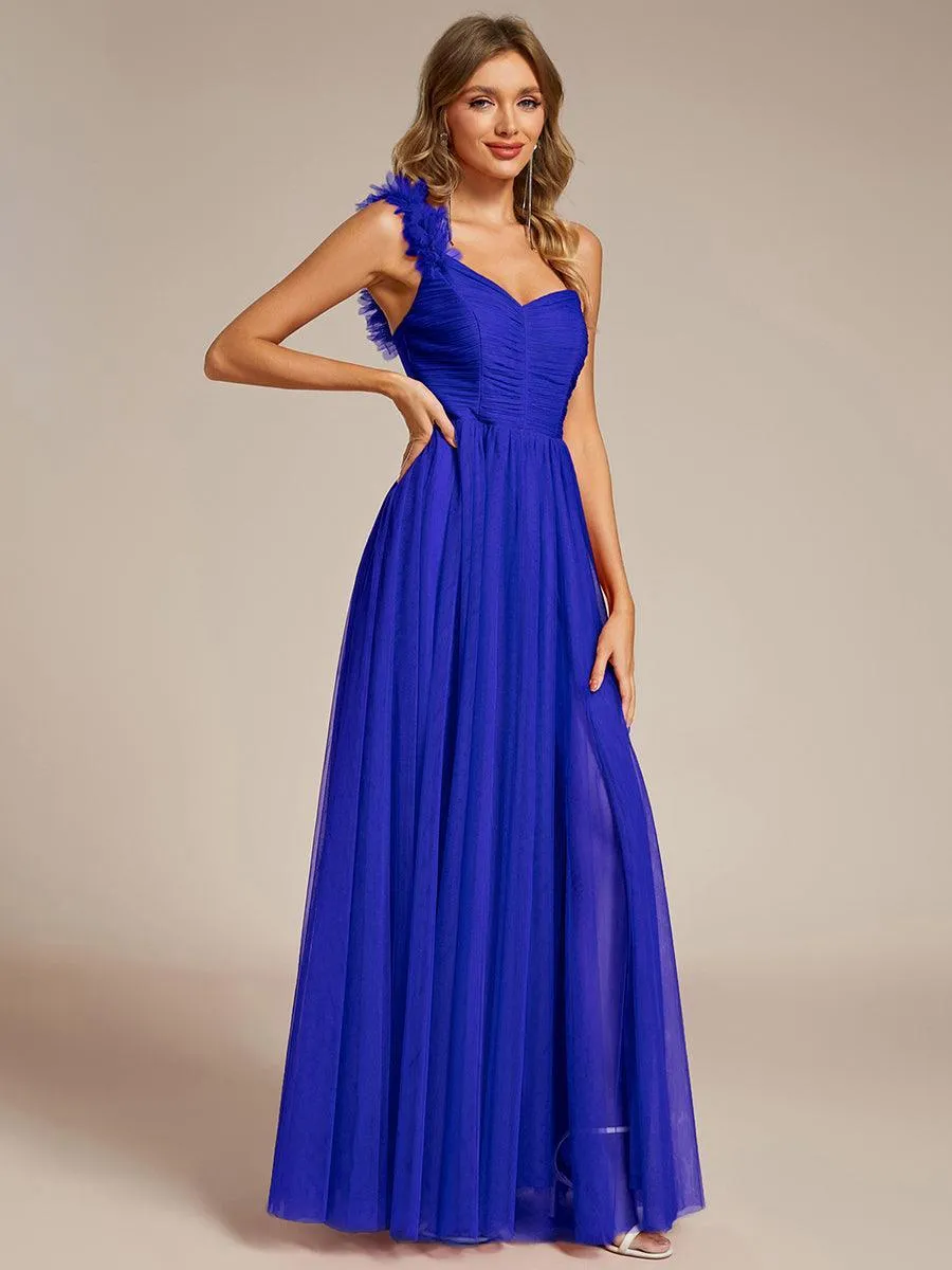 Robe de soirée asymétrique en tulle à appliqués et fente haute