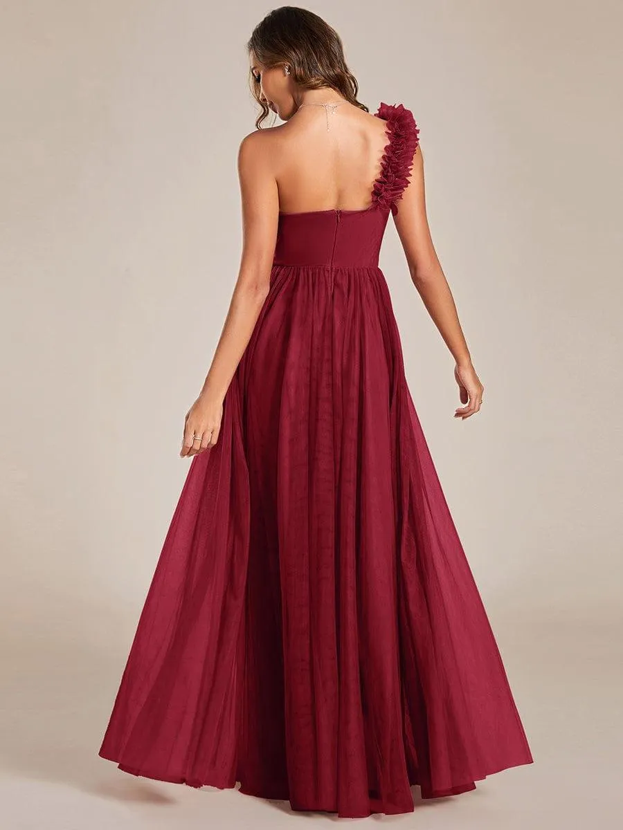 Robe de soirée asymétrique en tulle à appliqués et fente haute