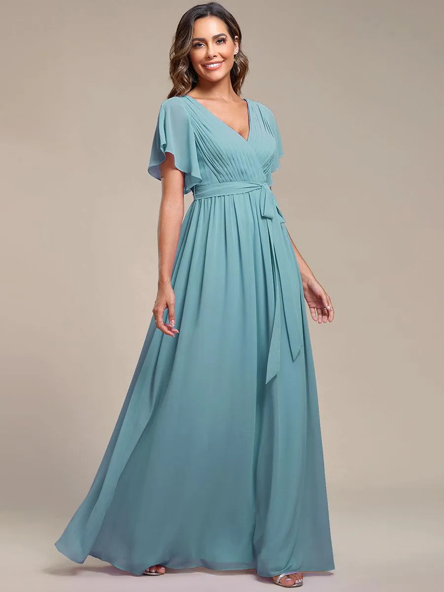 Robe de soirée en mousseline de soie à encolure en V et à manches flottantes