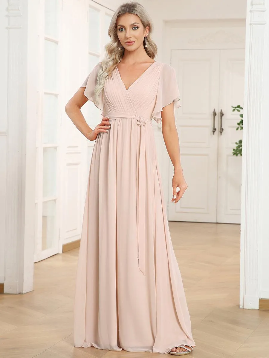 Robe de soirée en mousseline de soie à encolure en V et à manches flottantes