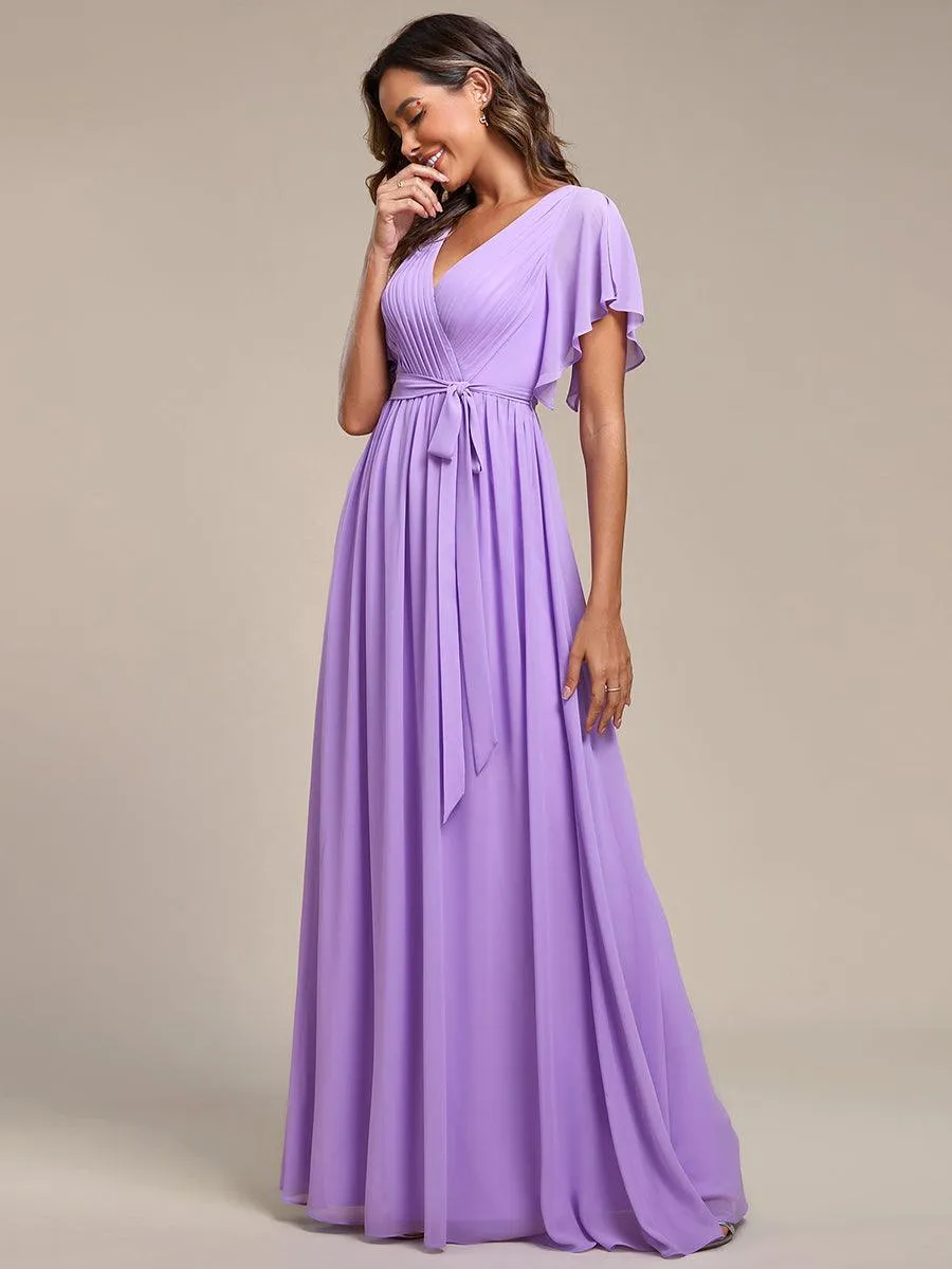 Robe de soirée en mousseline de soie à encolure en V et à manches flottantes