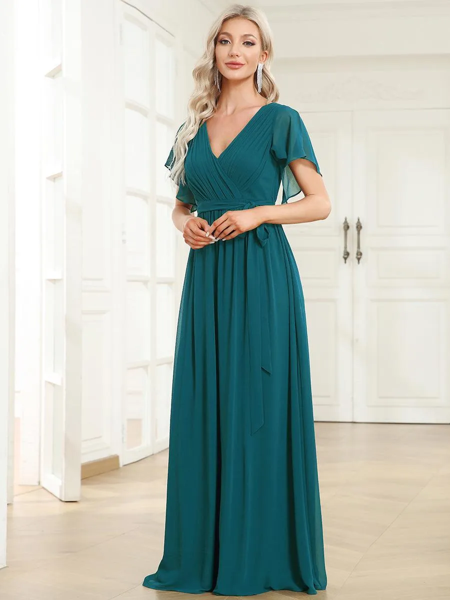 Robe de soirée en mousseline de soie à encolure en V et à manches flottantes