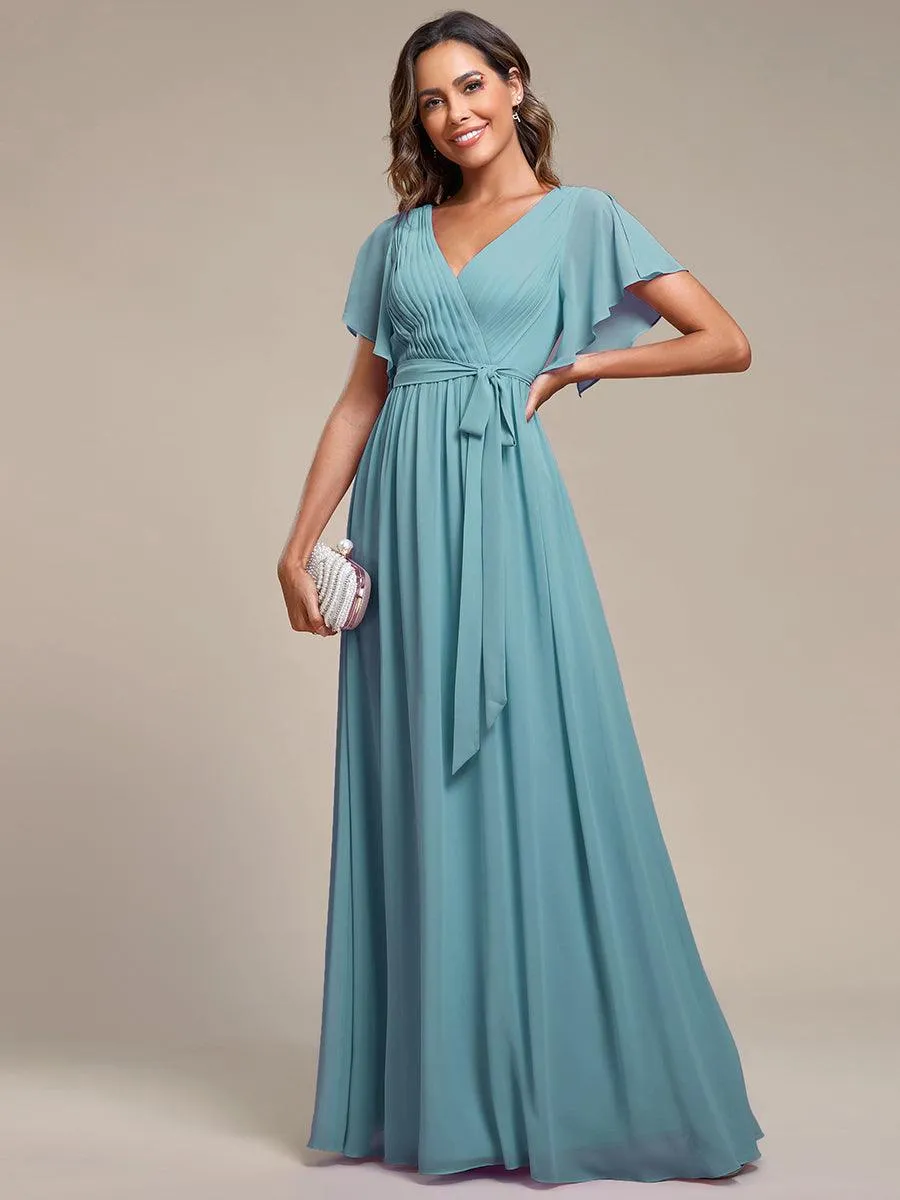 Robe de soirée en mousseline de soie à encolure en V et à manches flottantes