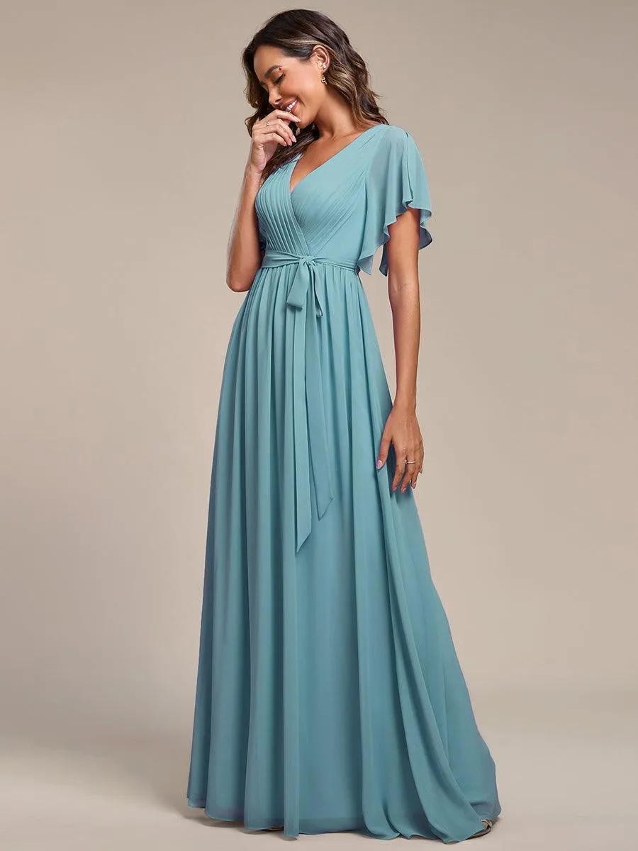Robe de soirée en mousseline de soie à encolure en V et à manches flottantes