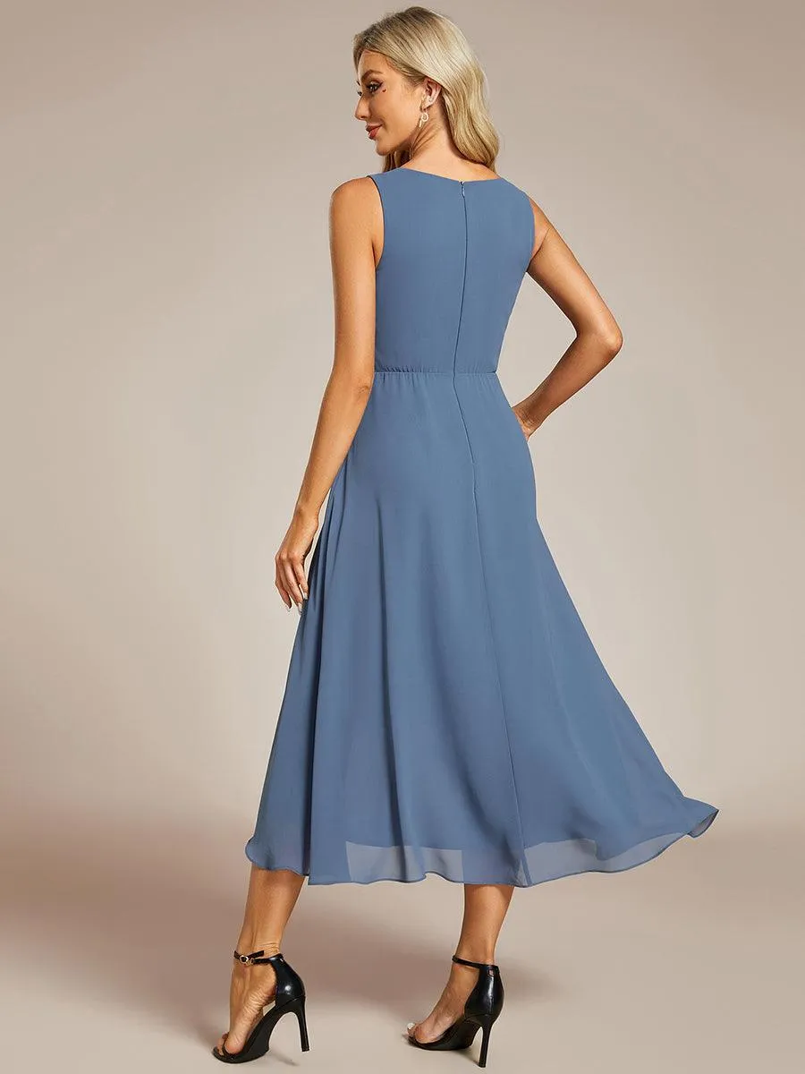 Robe d'invité de mariage haute-basse en mousseline de soie sans manches avec applique à la taille