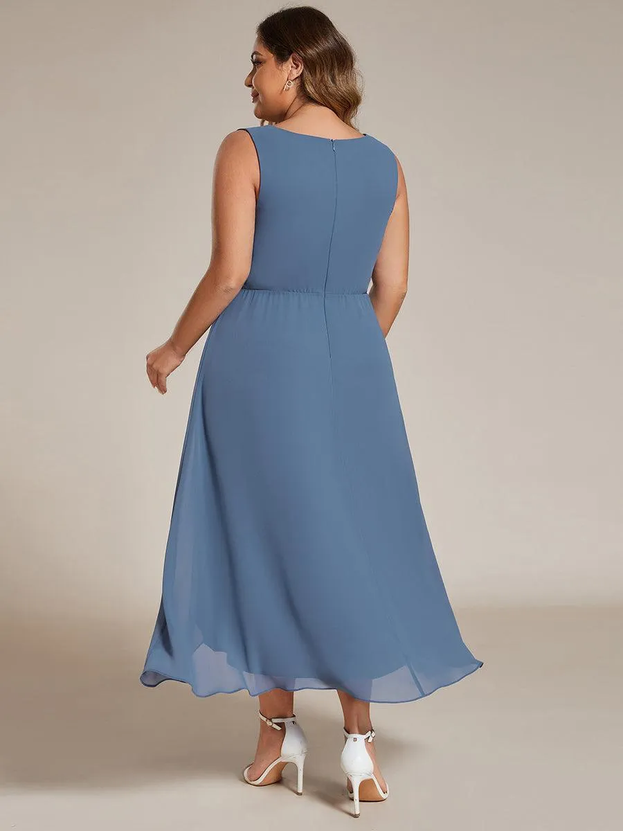 Robe d'invité de mariage haute-basse en mousseline de soie sans manches avec applique à la taille
