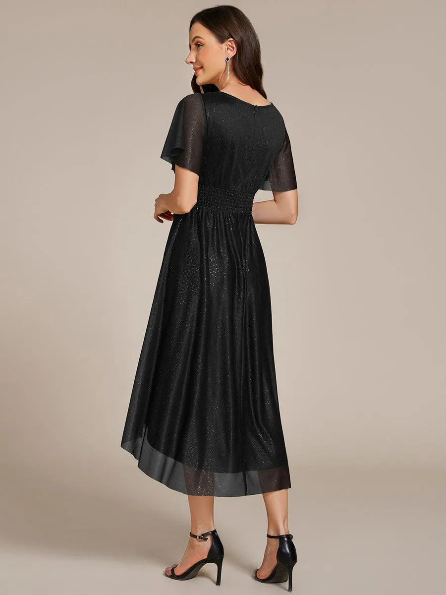 Robe d'invitée de mariage mi-longue à col rond et paillettes