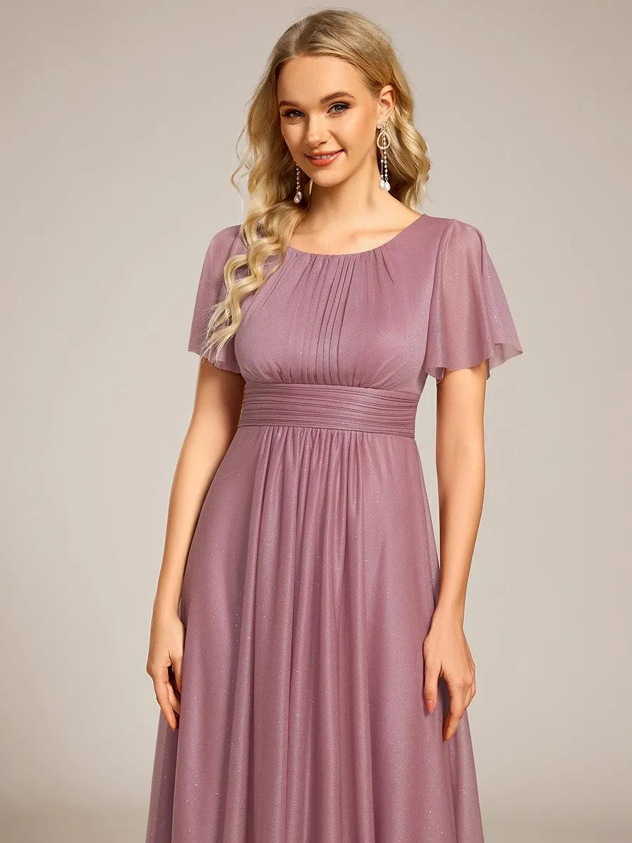 Robe d'invitée de mariage mi-longue à col rond et paillettes