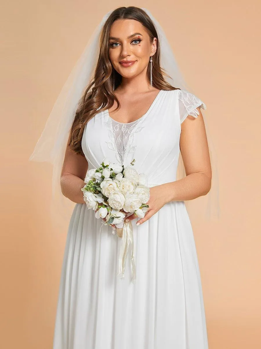 Robes de mariée grande taille à col en V et en mousseline plissée à manches courtes