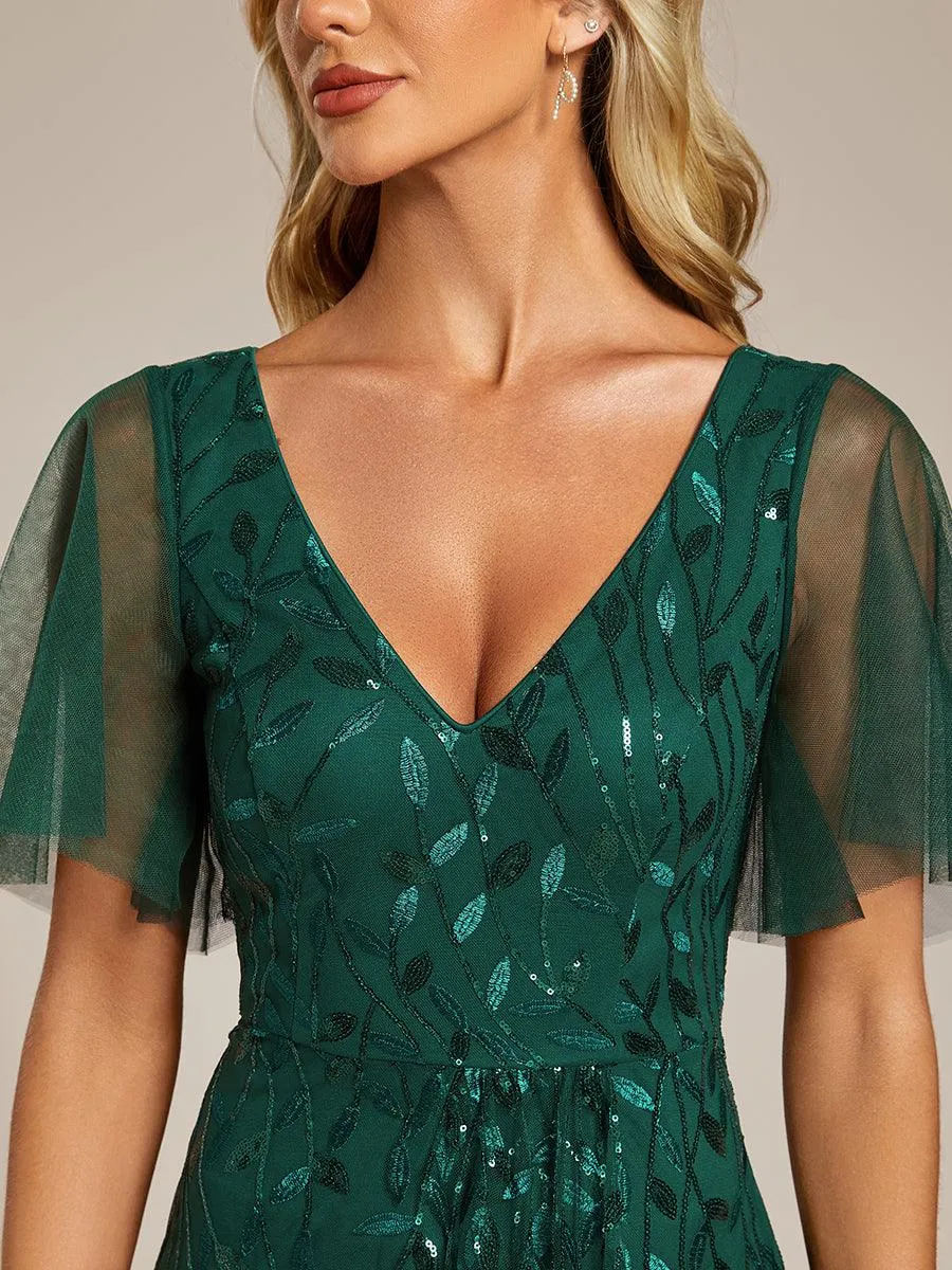 Robes de soirée pailletées à col en V et fente haute